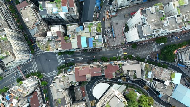 Top-down view of dense city rooftops and streets