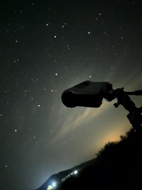 DWARF 3 telescope silhouetted against the night sky